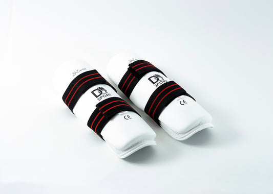 Canilleras DoEssencial – Protección firme y comodidad en cada combate